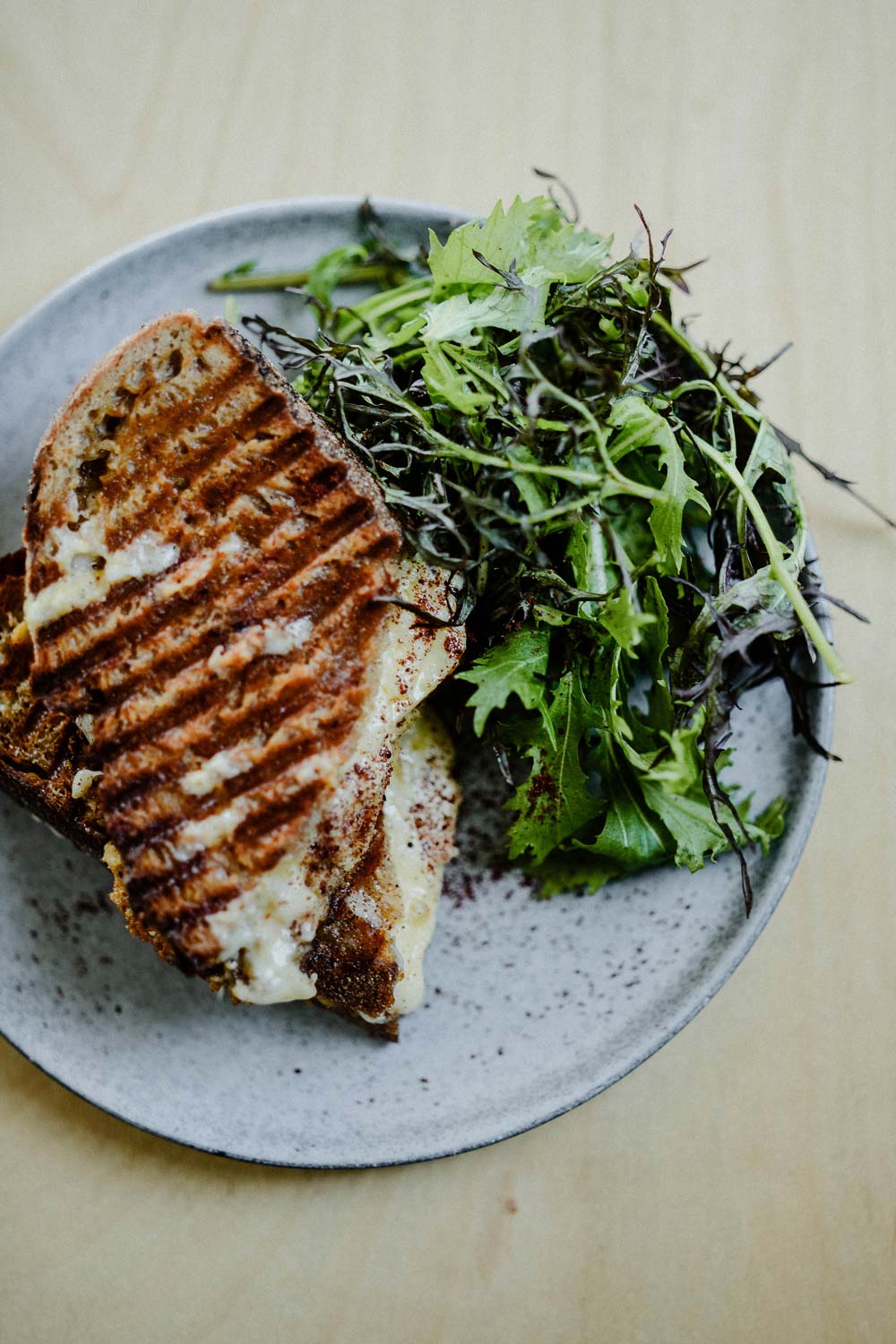 A grilled cheese and salad at Temple cafe